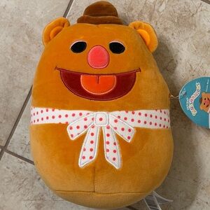 Squishmallows Brown and Orange Stuffed Animal Fozzie Bear.